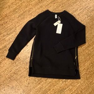 Very cozy sweatshirt with gold zipper flare! Never worn.